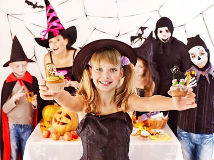 Kids in costumes at a Halloween party.